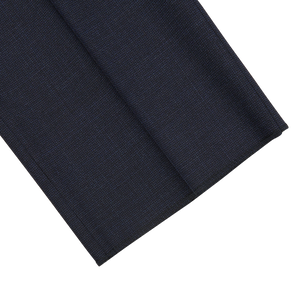 A close up of a Canali Navy Puppytooth Wool Stretch Flat Front Trousers.