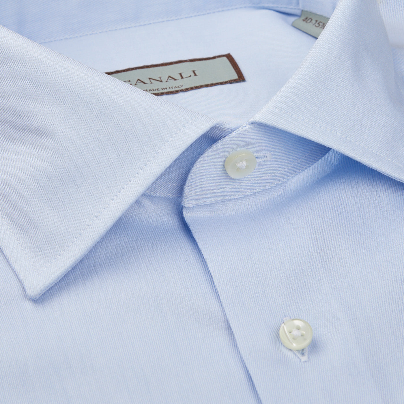 A close up of a sky blue dress shirt by Canali, the Sky Blue Cotton Single Cuff Shirt.