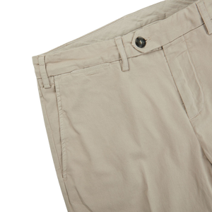The Canali Stone Beige Cotton Stretch Flat Front Chinos with a distressed appearance.