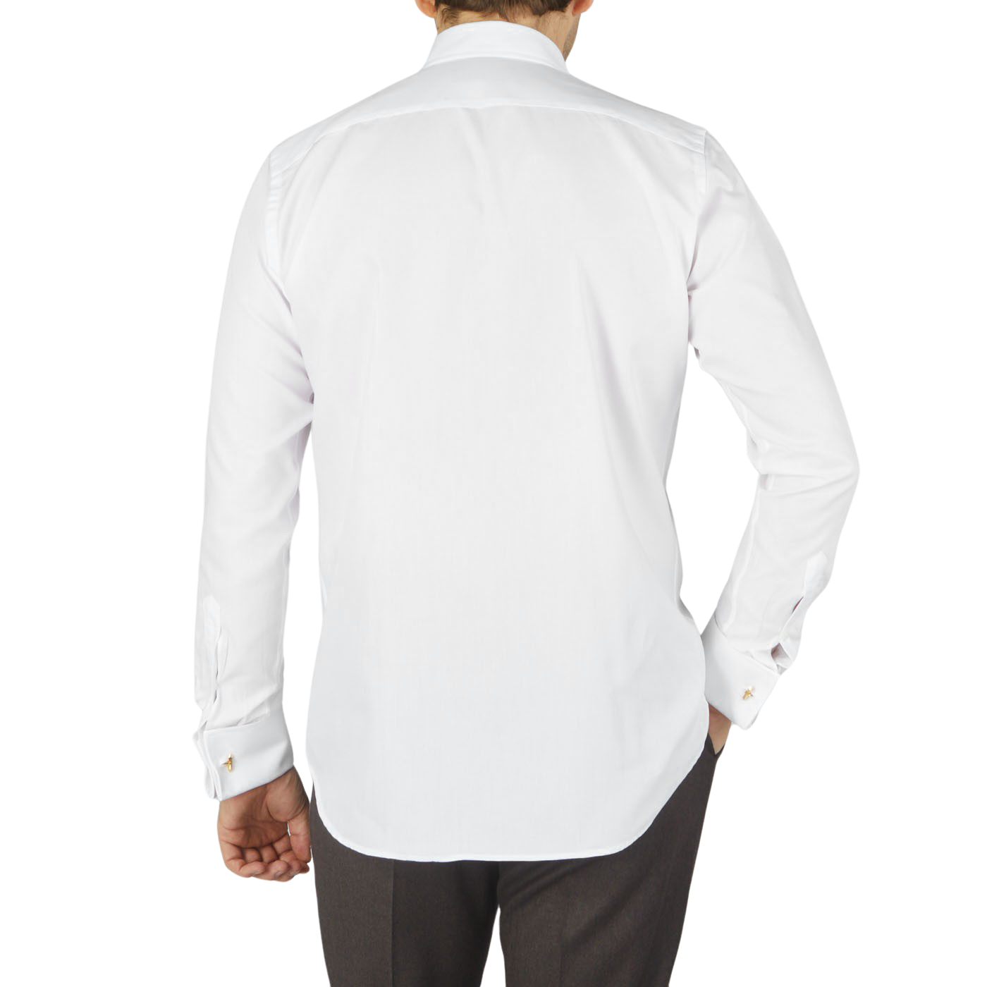The back view of a man wearing a Canali White Cotton Double Cuff Plain Dress Shirt.