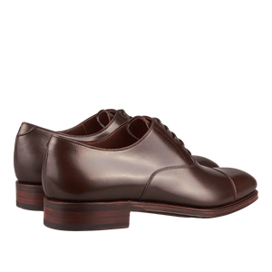 A pair of Brown Calf Rain Captoe Oxford Shoes crafted by Carmina craftsmen.