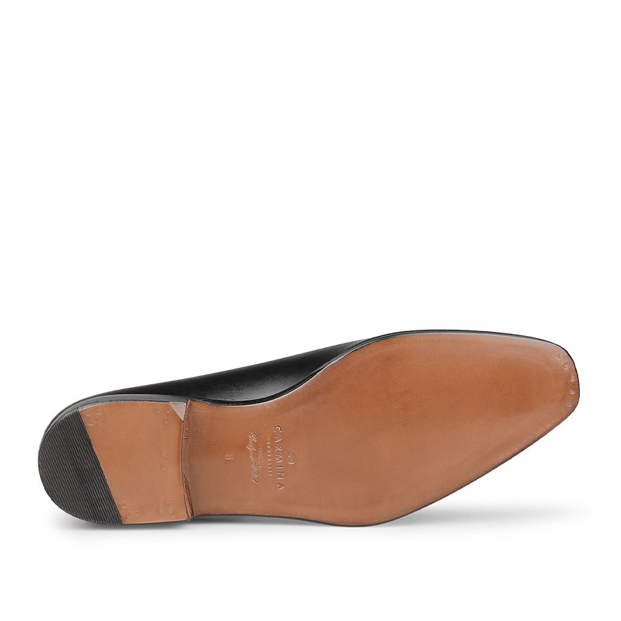 Bottom view of the Black Calf Leather Wholecut Rain Oxford Shoes, highlighting Carmina's refined craftsmanship with a brown sole and heel constructed using Goodyear welted techniques.