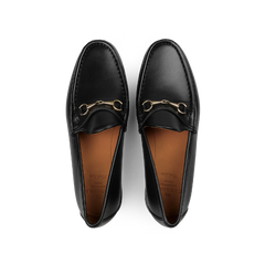 The Black Funchal Leather Xim Horsebit Loafers by Carmina, featuring decorative gold-tone buckles, viewed from above.