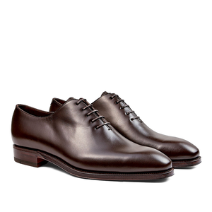A pair of Carmina polished brown calf leather Rain wholecut oxfords with laces.