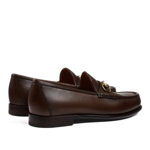 A pair of Brown Funchal Leather Xim Horsebit Loafers with tassels from Carmina.