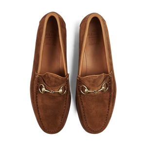 A pair of Tobacco Suede Leather Xim Horsebit Loafers by Carmina with horsebit detailing.