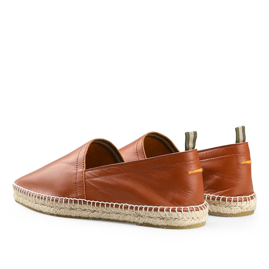 Castañer's Chestnut Brown Leather Pablo Espadrilles feature tan stitching, natural jute woven rope soles, and green pull tabs, seen from a rear angle.