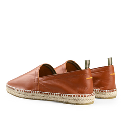 Castañer's Chestnut Brown Leather Pablo Espadrilles feature tan stitching, natural jute woven rope soles, and green pull tabs, seen from a rear angle.