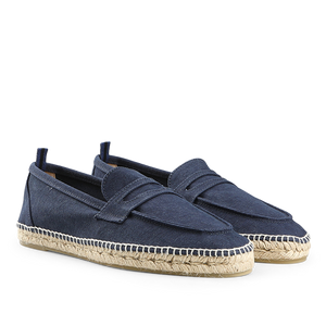 The Castañer Dark Blue Cotton Canvas Nacho Espadrilles feature a cotton canvas upper, rope soles, slip-on design, and subtle top stitching.