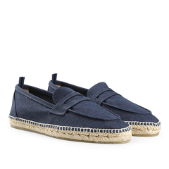 The Castañer Dark Blue Cotton Canvas Nacho Espadrilles feature a cotton canvas upper, rope soles, slip-on design, and subtle top stitching.