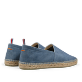The men's Denim Blue Cotton Canvas Pablo espadrilles with a red and white stripe by Castañer.