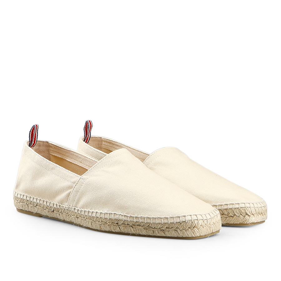 Castañer's Ivory Beige Cotton Pablo Espadrilles are classic summer shoes featuring rope soles and red-striped pull tabs at the back.