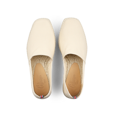 The Castañer Ivory Beige Cotton Pablo Espadrilles, seen from above with their woven soles, are a true summer classic.