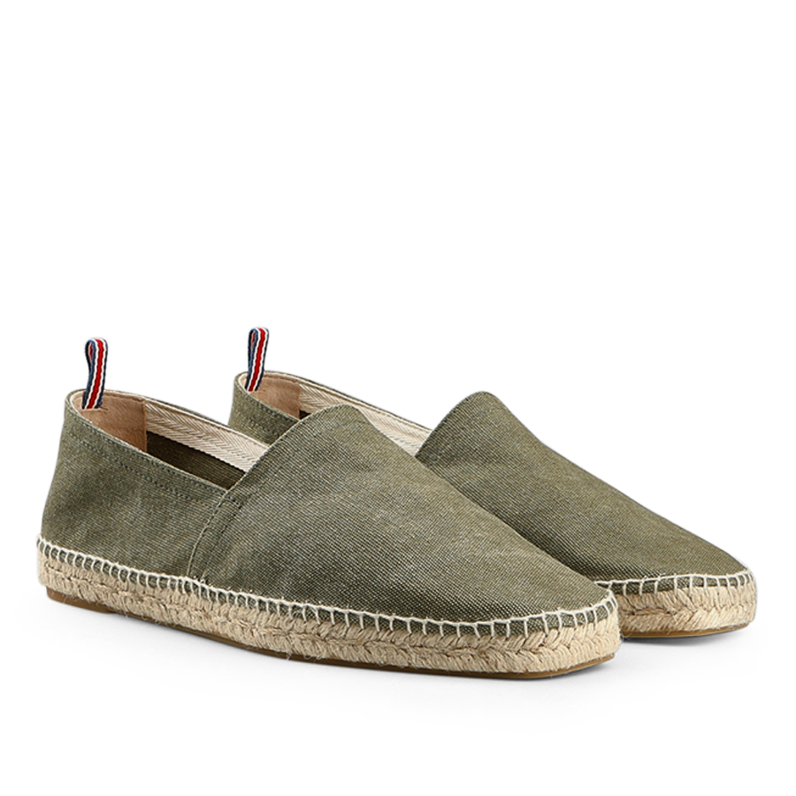 A summer classic, the Castañer Olive Green Cotton Canvas Pablo Espadrilles feature slip-on style with cotton fabric, natural jute soles, and small fabric tags on the heels.