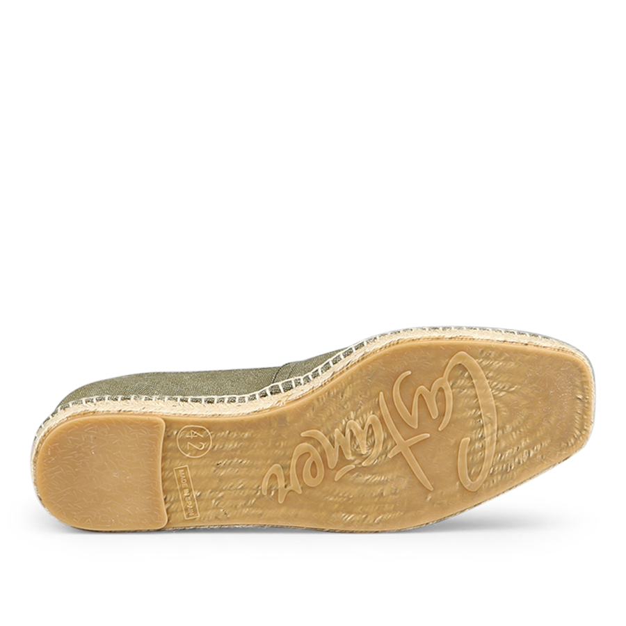 The sole of the Olive Green Cotton Canvas Pablo Espadrilles by Castañer features a textured brown surface with a distinct tread, capturing the summer classic vibe, crafted from cotton and natural jute.