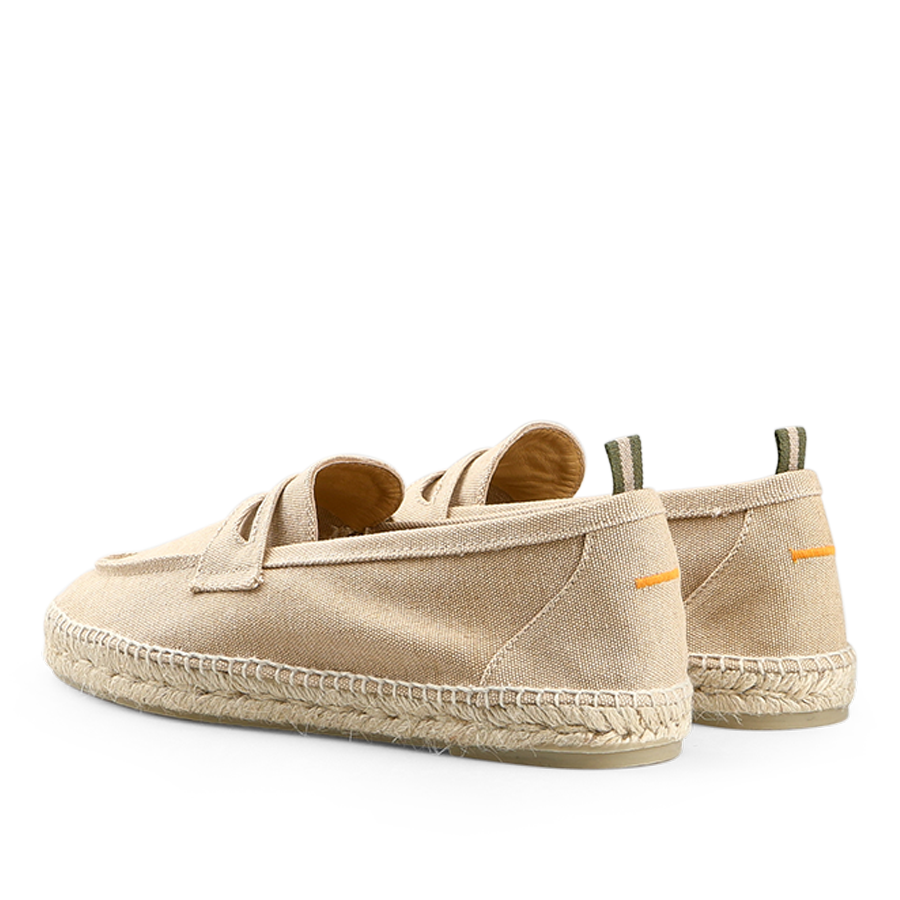 Sand Beige Cotton Canvas Nacho Espadrilles by Castañer, crafted from cotton canvas with woven soles and green heel tabs, viewed from the back.