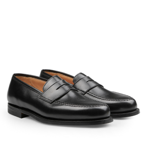 A pair of Crockett & Jones Black Fine Calf Leather Boston Loafers featuring a sleek design and visible stitching, showcased against a plain white background.