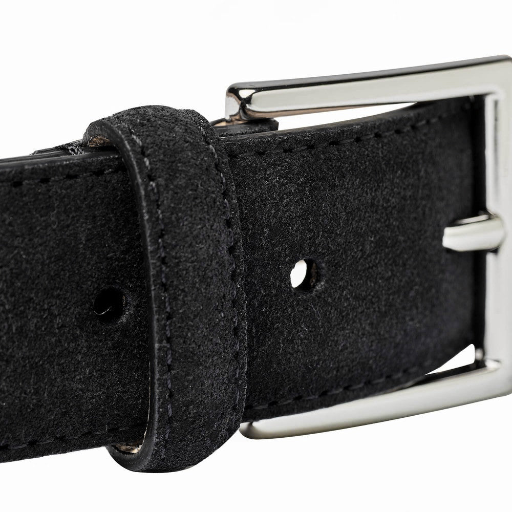 Close-up of the Black Suede Leather 32mm Belt, featuring a silver-colored buckle, crafted by Crockett & Jones.