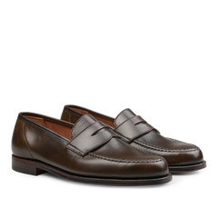 A pair of Dark Brown Cordovan Leather Harvard Loafers by Crockett & Jones, featuring a Goodyear welt construction with visible stitching, round toe design, and crafted from premium Horween leather, displayed on a plain white background.