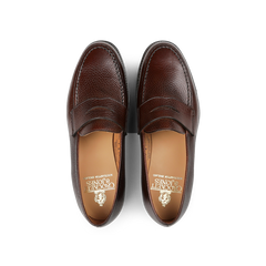 Dark brown Country Calf Leather Boston loafers by Crockett & Jones, showcasing Goodyear-welted stitching detail, captured from an overhead view with visible branding inside the shoes.