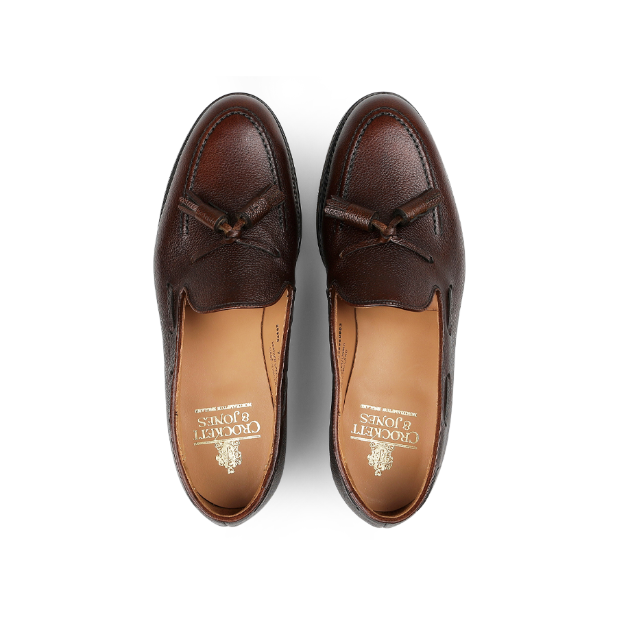 An elegant pair of Crockett & Jones Dark Brown Pebble Grain Leather Cavendish II loafers, viewed from above.