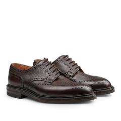 The Dark Brown Scotch Grain Leather Pembroke Brogues from Crockett & Jones are expertly crafted, featuring laces and classic perforated detailing.