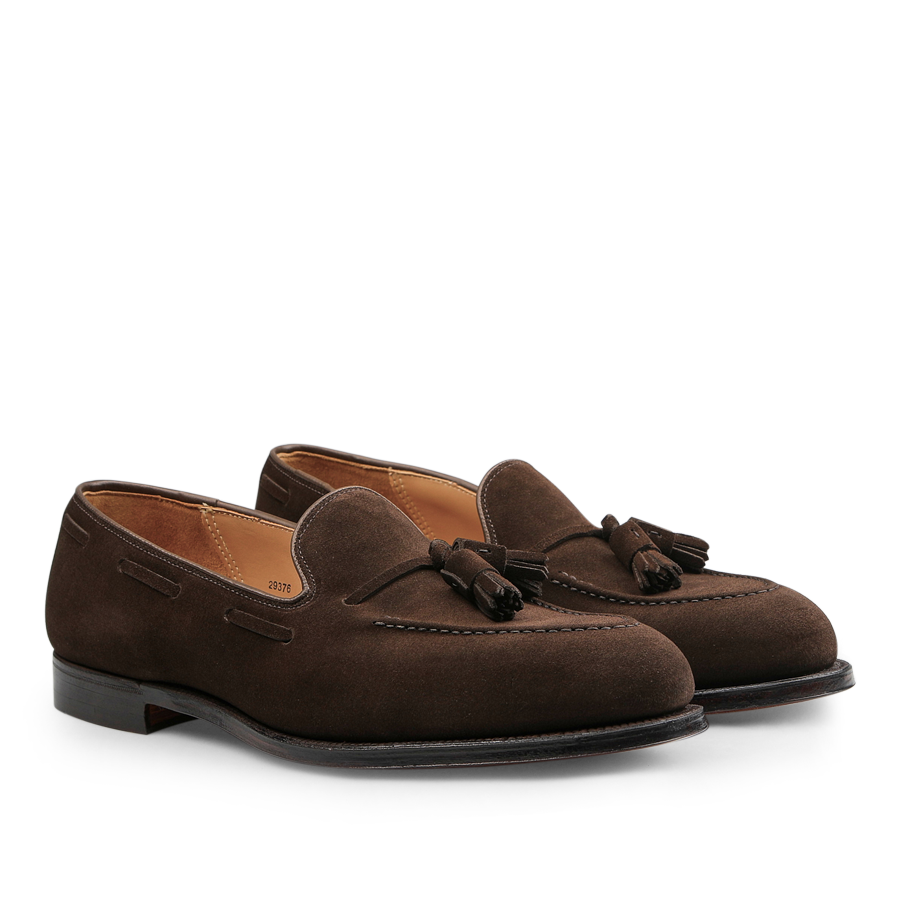 Crockett & Jones presents their expertly crafted Goodyear-welted Dark Brown Suede Leather Cavendish II Loafers, featuring a low heel, tassels, and intricate stitching details.