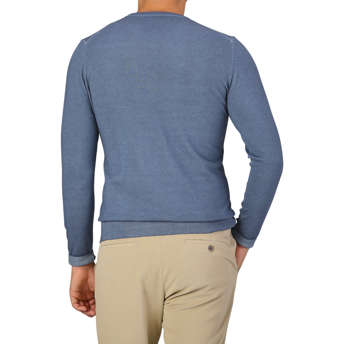 A person wearing a light blue long-sleeve shirt and beige pants, photographed from the back against a plain backdrop, their ensemble complemented by Daniele Fiesoli's Dark Blue Melange Merino Wool Crewneck.