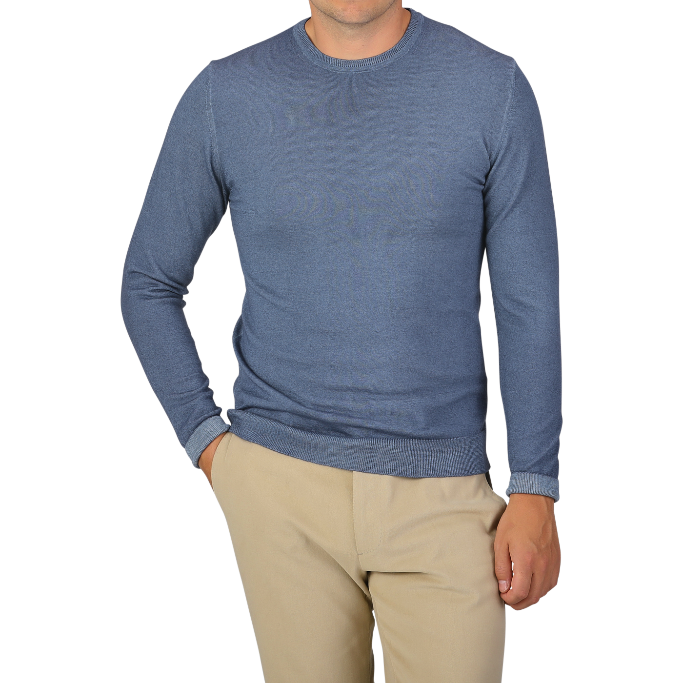 A person wearing a Daniele Fiesoli Dark Blue Melange Merino Wool Crewneck and beige pants stands with one hand in their pocket against a plain background.