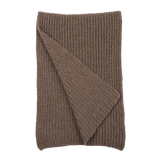 A folded Corteccia Brown Cable Knit Cashmere Scarf by Daniele Fiesoli with one corner slightly turned over.