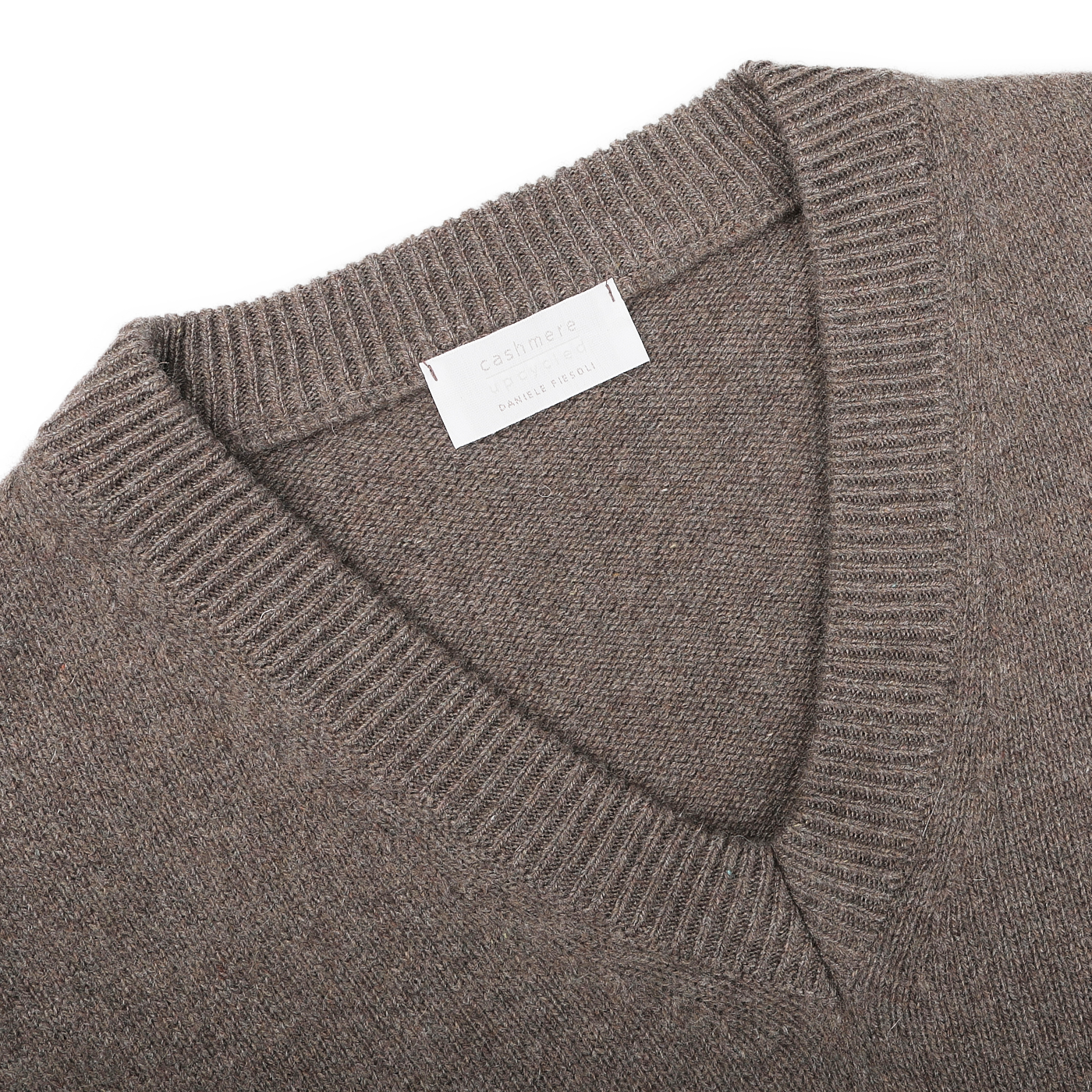 Experience the elegance of Italian knitwear and sustainable luxury with the Corteccia Brown Cashmere V-Neck Sweater by Daniele Fiesoli, featuring a tag that proudly declares "cashmere, made in Italy.