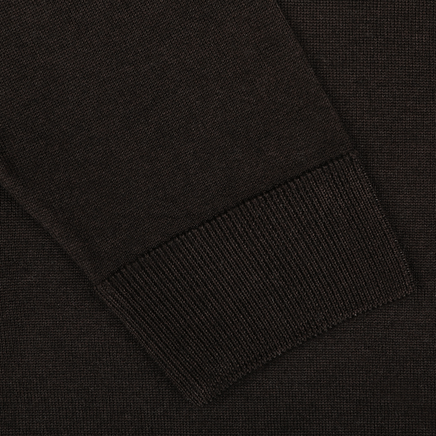 Close-up of a long sleeve with a ribbed cuff on the Dark Brown Merino Wool Crewneck by Daniele Fiesoli, made in Italy.