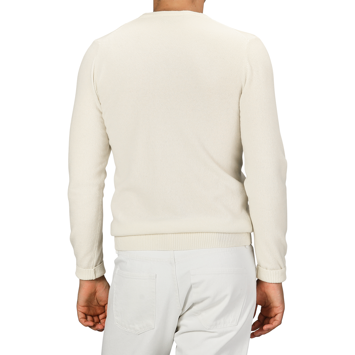 Individual wearing a Daniele Fiesoli Ecru Wool Cashmere Crewneck sweater made in Italy and white pants, captured from behind.