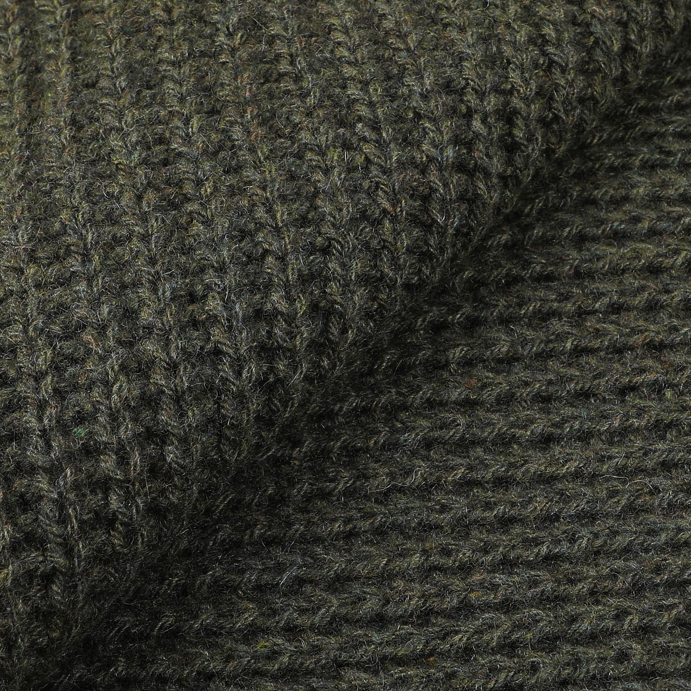 Close-up view of the Military Green Cable Knit Cashmere Scarf by Daniele Fiesoli, showcasing its ribbed texture in a rich green hue reminiscent of military attire.