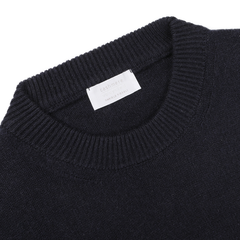 Close-up of the Daniele Fiesoli Navy Blue Cashmere Crewneck Sweater, featuring a white label at the neck and highlighting exquisite knitwear craftsmanship.