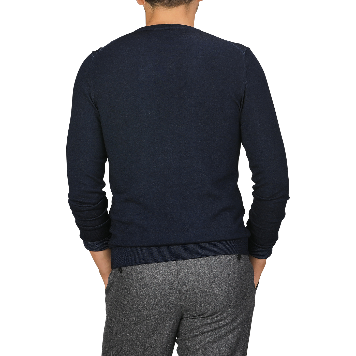 Back view of a person wearing the Navy Blue Melange Merino Wool Crewneck by Daniele Fiesoli and gray pants, standing with hands in pockets.