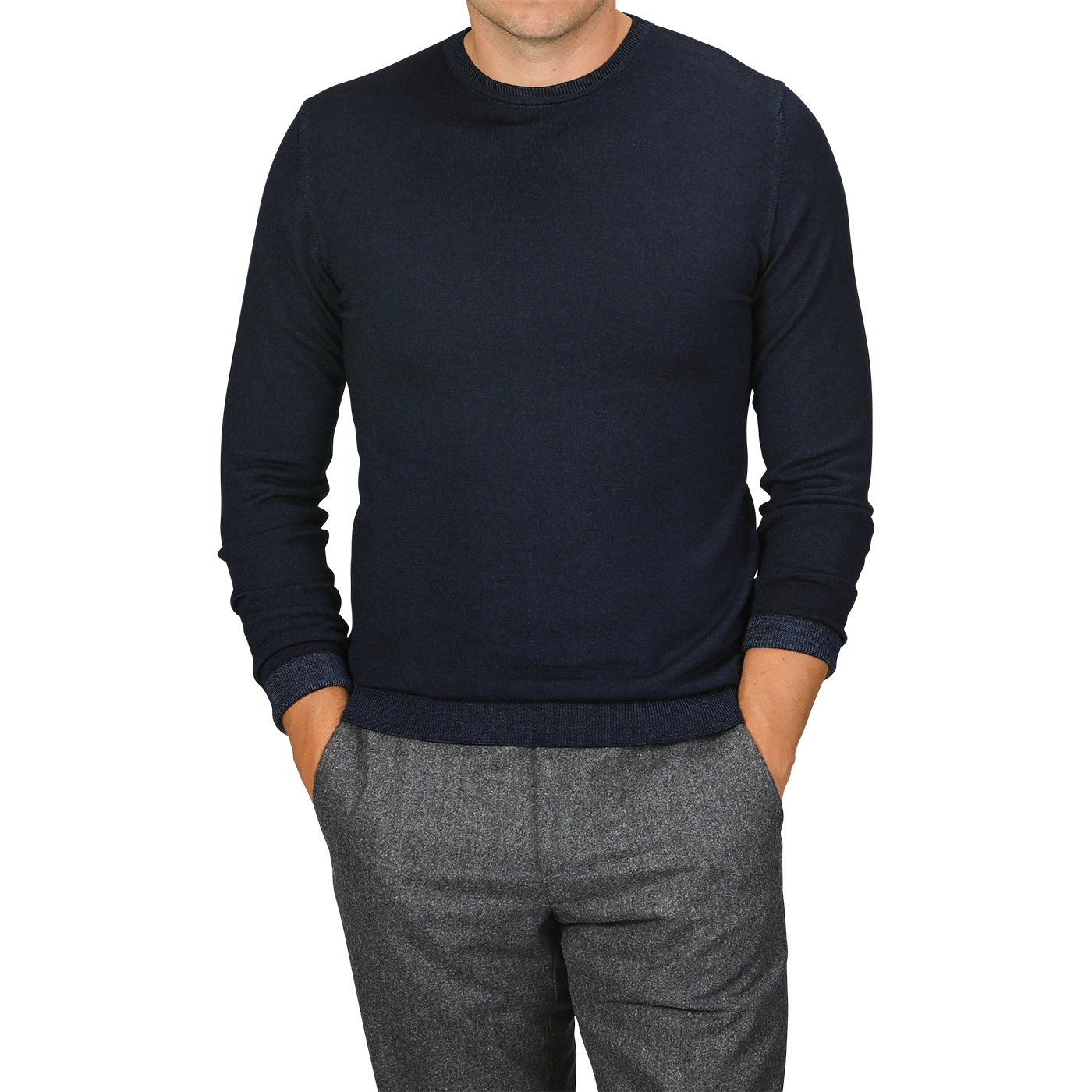 A person wearing a Navy Blue Melange Merino Wool Crewneck by Daniele Fiesoli and gray pants, with their hands in the pockets of their pants. The head is cropped out of the image.