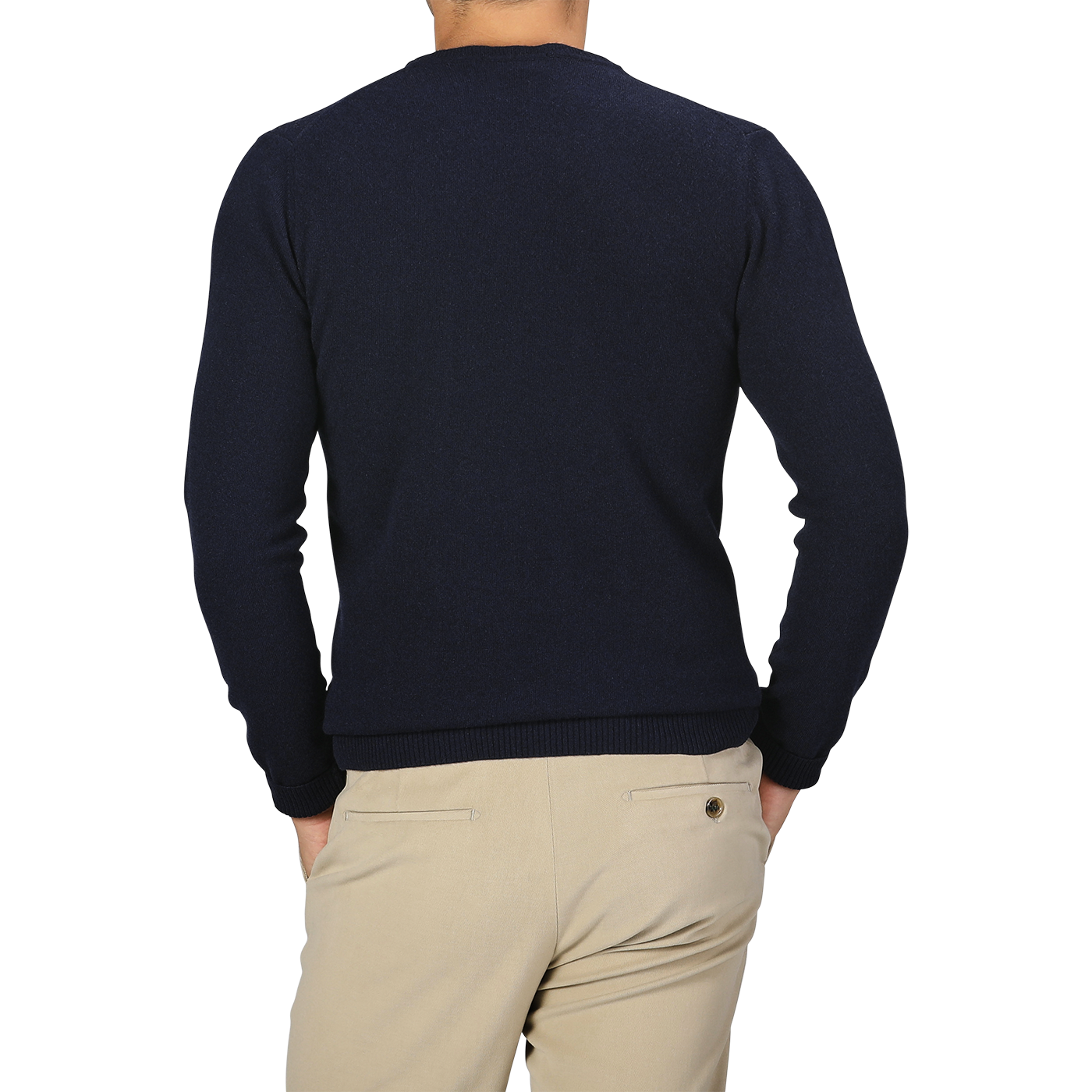 A person stands with their back to the camera, donning a Navy Blue Wool Cashmere Crewneck from Daniele Fiesoli and beige pants.