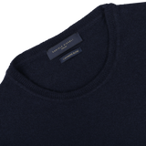 Close-up of a Navy Blue Wool Cashmere Crewneck by Daniele Fiesoli, featuring a label that proudly states "Made in Italy.