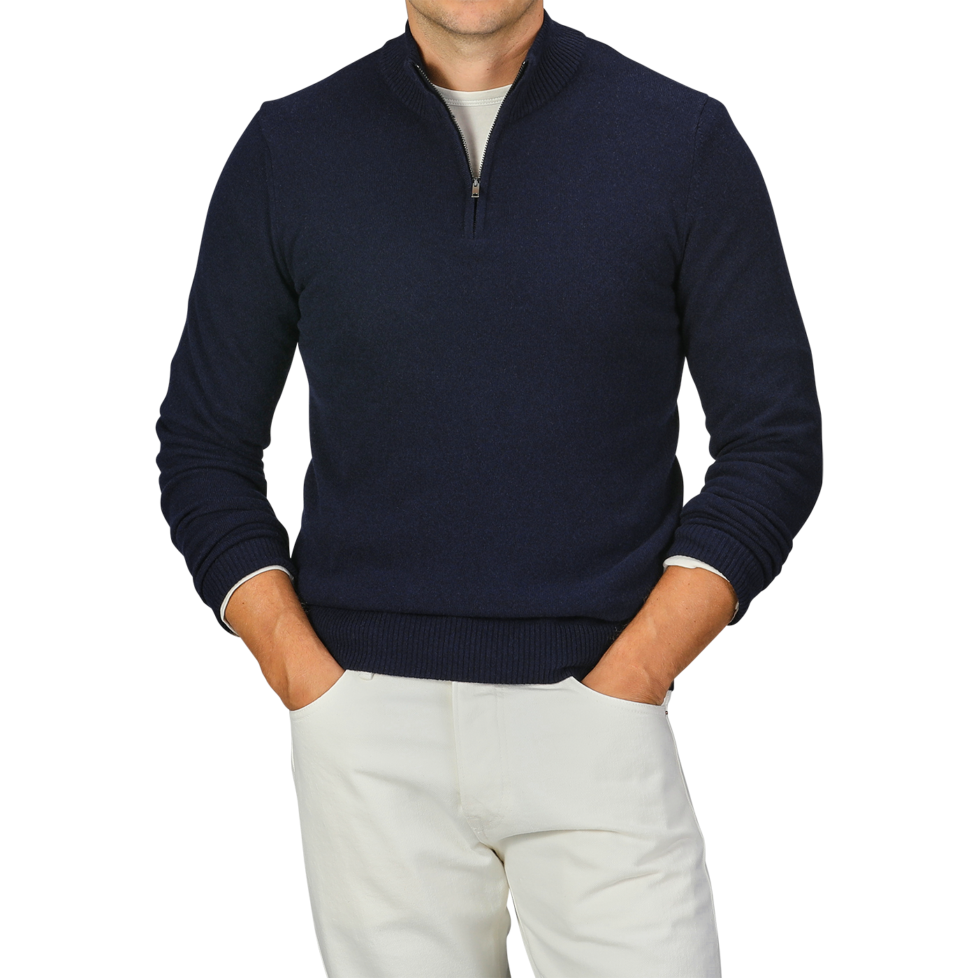 A person wearing a Navy Blue Wool Cashmere Quarter Zip Sweater by Daniele Fiesoli, paired with light-colored pants, stands with hands in pockets. The person's head is not visible in the image.