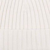 Close-up of the Nuvola Ecru Ribbed Cashmere Beanie by Daniele Fiesoli, showcasing its white, ribbed knit fabric with vertical lines and a folded section near the bottom, reminiscent of Italian knitwear.