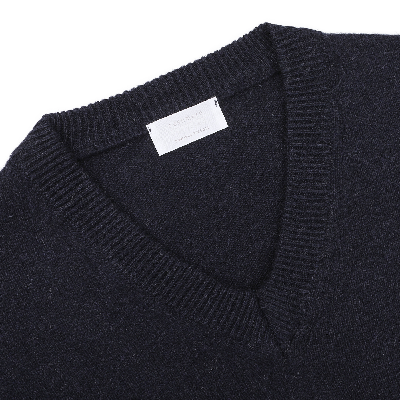 The Daniele Fiesoli Navy Blue Cashmere V-Neck Sweater is crafted from upcycled cashmere and features a white label inside the collar, made in Italy.