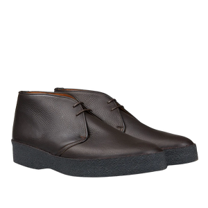 The Dark Brown Savage Grain Hi Top Chukka Boots by Sanders are crafted from savage grain leather and feature black rubber crepe soles and laces.