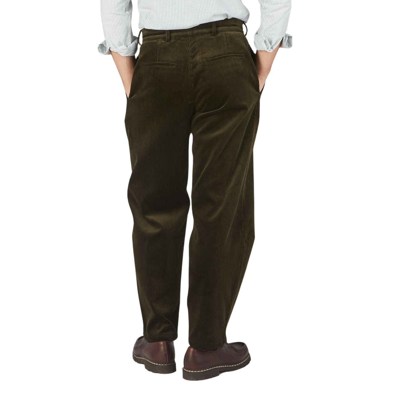 The back view of a man wearing Dark Olive Cotton Corduroy Balloon Trousers made by De Bonne Facture.