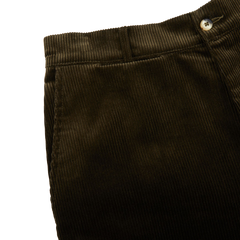 A close up of a pair of Dark Olive Cotton Corduroy Balloon Trousers made from heavy cotton corduroy by De Bonne Facture.