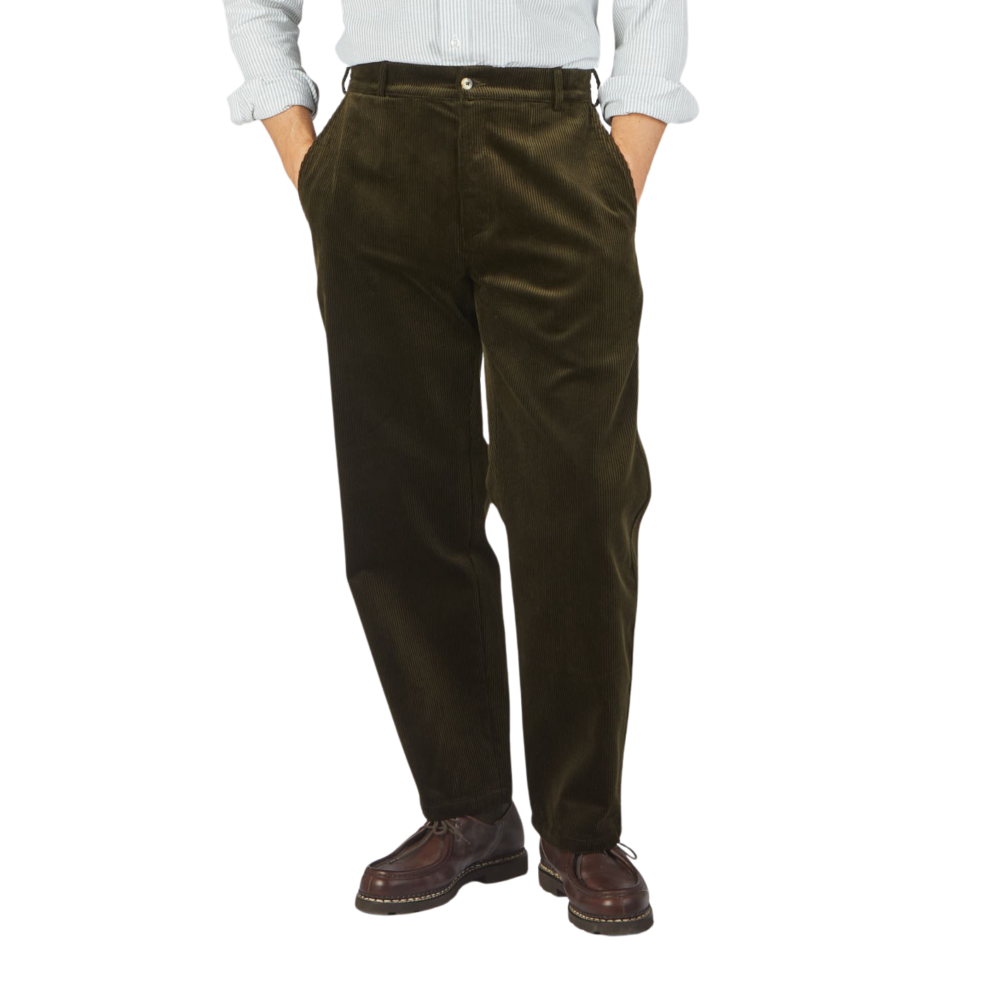 A man wearing De Bonne Facture Dark Olive Cotton Corduroy Balloon trousers and a white shirt.