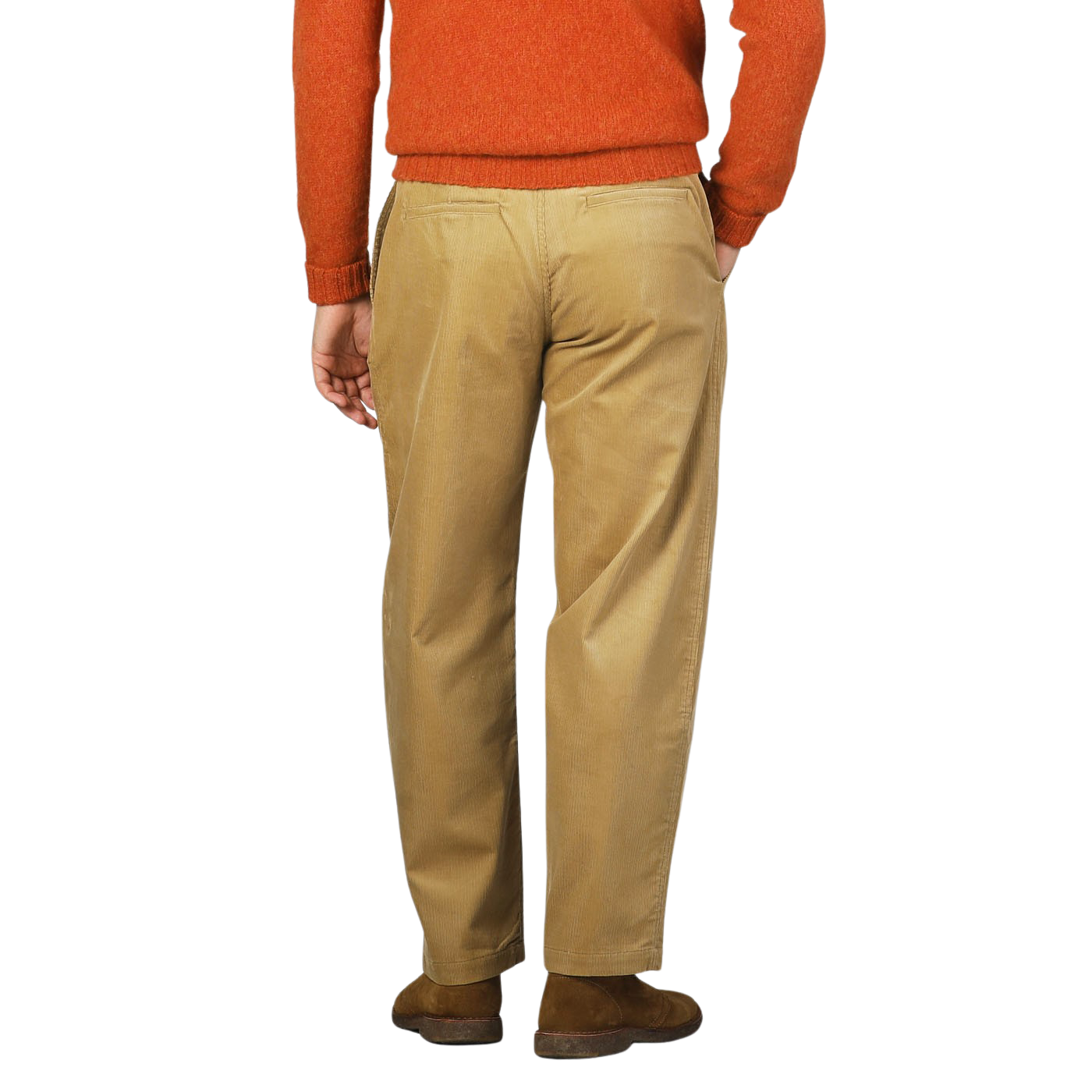 Person wearing a burnt orange sweater and De Bonne Facture Gold Mustard Cotton Corduroy Balloon Trousers, standing with their back facing the camera against a plain background.