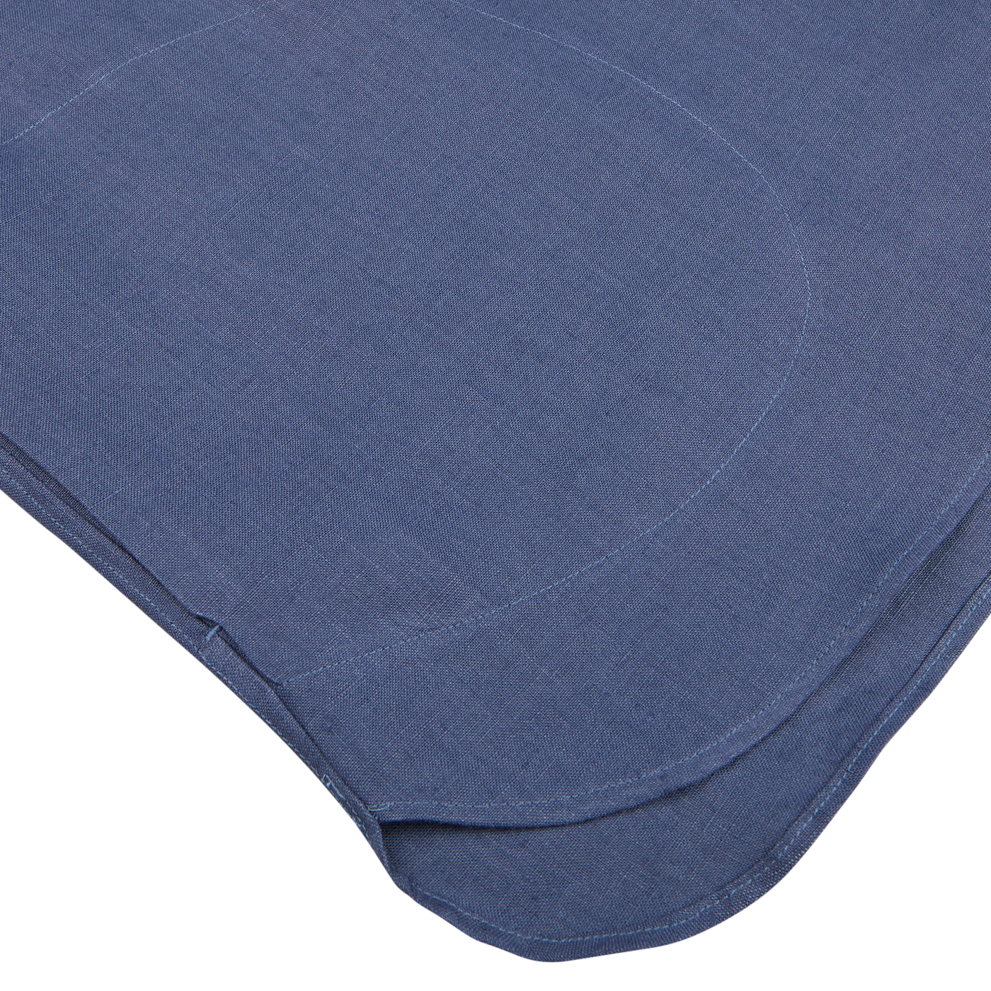 Close-up of a Pastel Blue Belgian Linen Two Pocket Overshirt by De Bonne Facture with visible stitching and textured design, isolated on a white background.