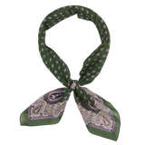 Pine Green Paisley Cotton Voile Bandana by De Bonne Facture neatly tied in a knot on a white background.