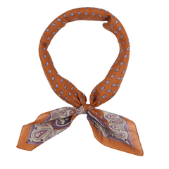 A neatly tied Sienna Brown Paisley Cotton Voile Bandana from De Bonne Facture displayed against a white background.